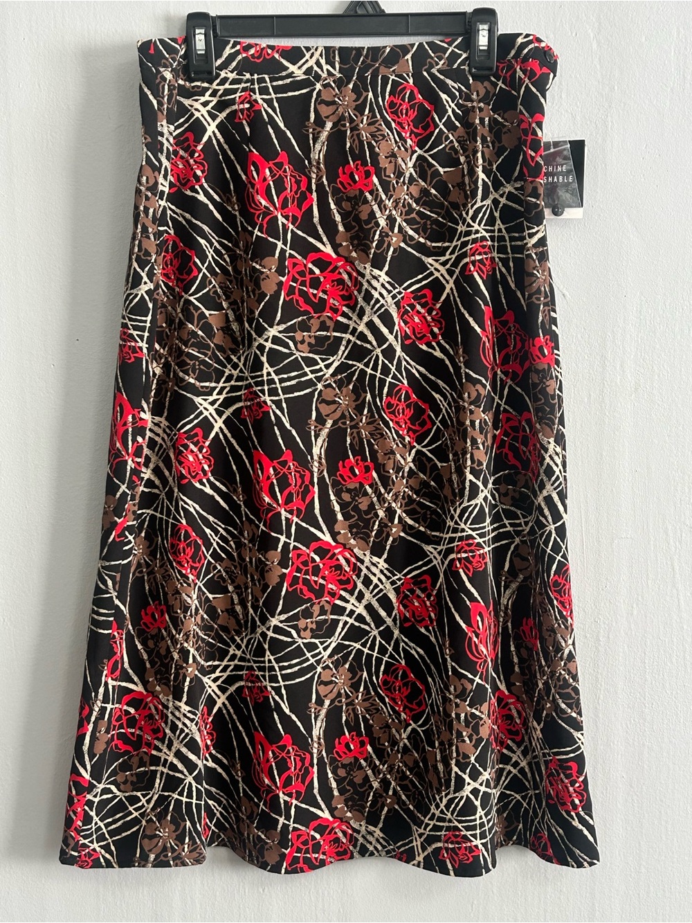 Sag Harbor Black A-Line Skirt with Red Floral and Brown Graphic Accents